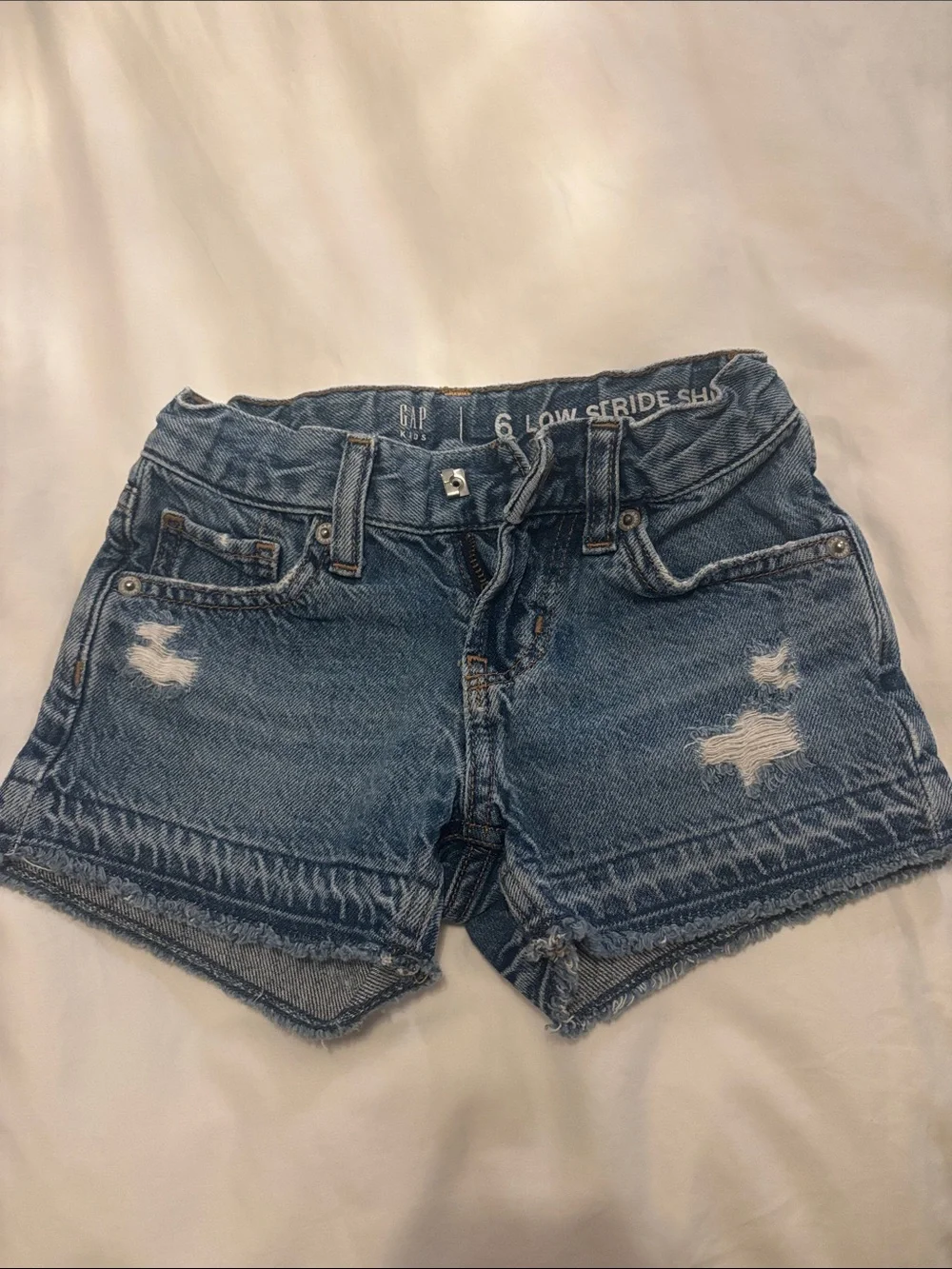 GAP kids Low-Rise Distressed Denim Shorts - Blue size 6 kids